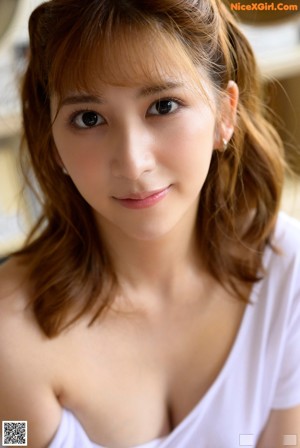 A woman in a black lingerie walking down a hallway.